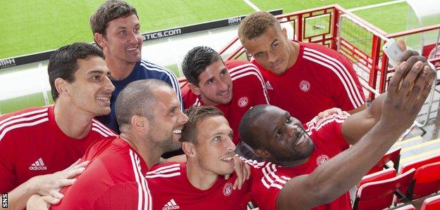 Hamilton manager Martin Canning poses with new signings Chris Turner, Lucas Tagliapietra, Alan Martin, Carlton Morris, Antons Kurakins and Christian Nade