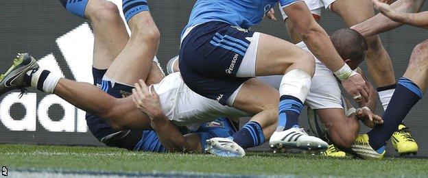 Jonathan Joseph scores his third try in England's win over Italy