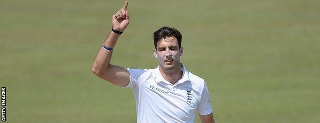 Steven Finn celebrates a wicket