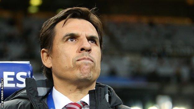 Chris Coleman watches Wales against France in Paris