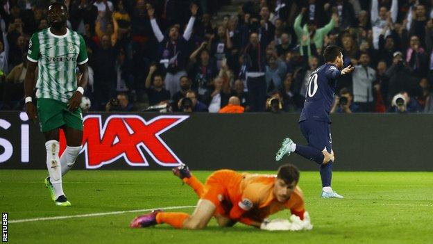 Lionel Messi celebrates scoring for Paris St-Germain in the Champions League