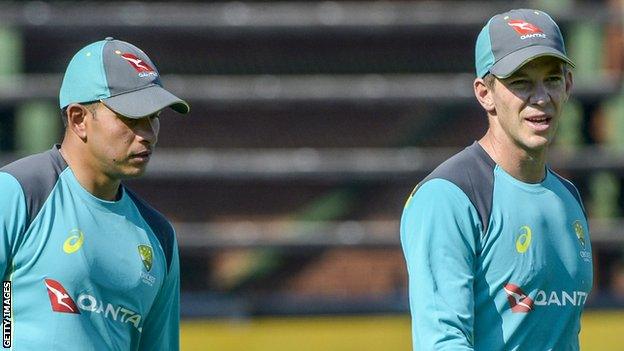 Usman Khawaja (left) and Tim Paine