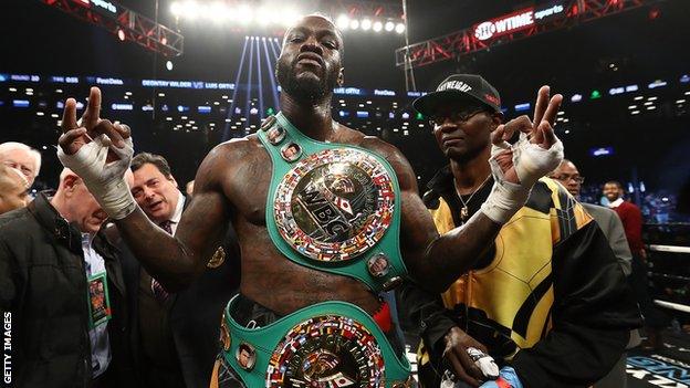 Deontay Wilder poses after knocking out Luis Ortiz in the tenth round of their WBC Heavyweight Championship fight at Barclays Center on 3 March