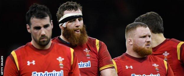 Dejected Wales players including Jake Ball leave the field after the RBS Six Nations match between Wales and England