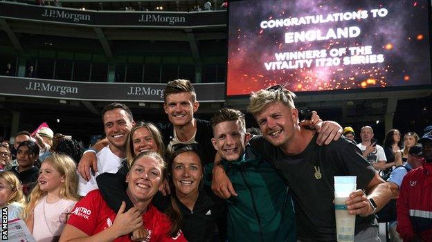 Heather Knight celebrates England's win with family and friends