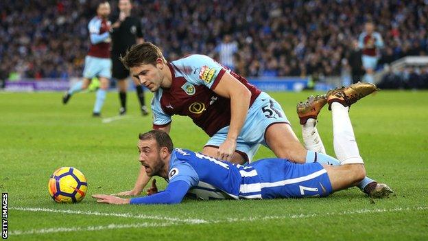 Glenn Murray (bottom), James Tarkowski (above)