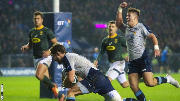 Peter Horne scored a stunning opening try for Scotland, after brilliant play by Huw Jones (right)