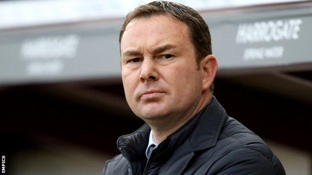 Derek Adams watches his Plymouth side from the touchline