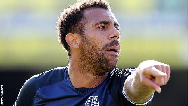 Anton Ferdinand gestures towards his Southend team-mates