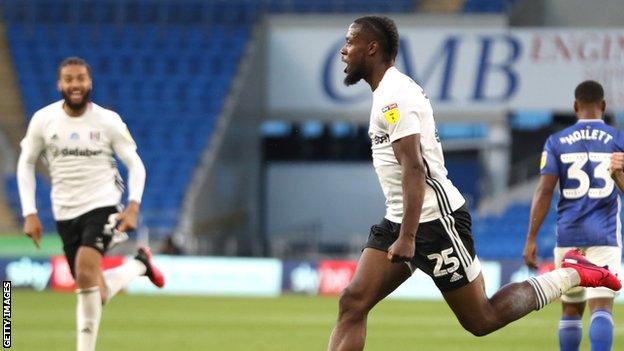 Josh Onomah celebrates