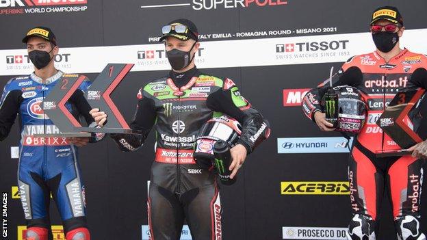 Six-time champion Jonathan Rea is flanked on the podium by title challengers Toprak Razgatlioglu and Scott Redding