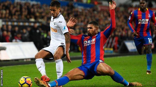 Ruben Loftus-Cheek (right) attempts to win the ball