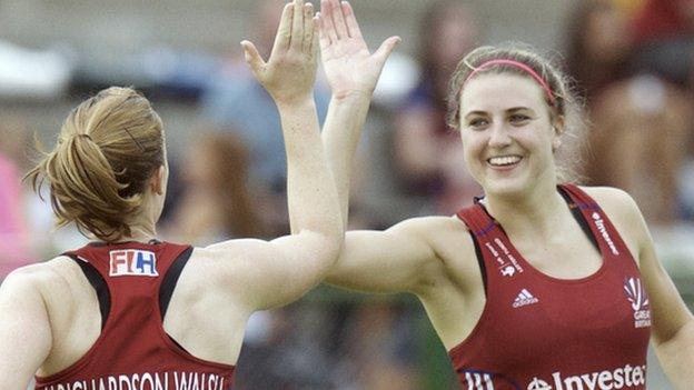 Lily Owsley is congratulated by team-mate Kate Richardson-Walsh after a goal for England