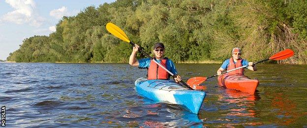 Men kayaking