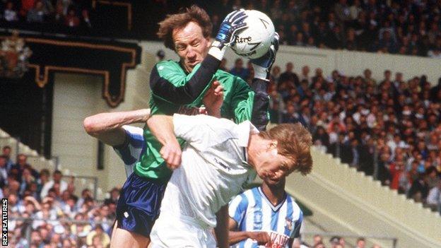 Coventry City keeper Steve Ogrizovic jumps above Tottenham and Scotland defender Richard Gough to take a high ball at Wembley in 1987