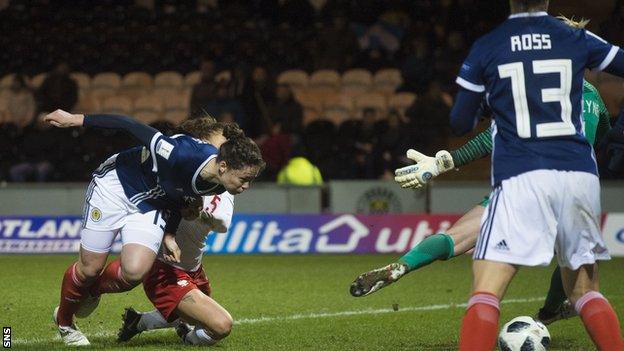 Scotland's Zoe Ness stoops to score against Poland