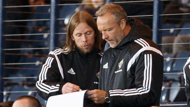 Austin Macphee in the Northern Ireland dugout