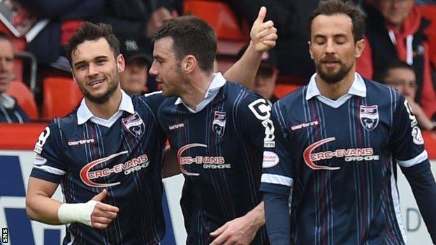 Ross County's Alex Schalk (left) celebrates his goal