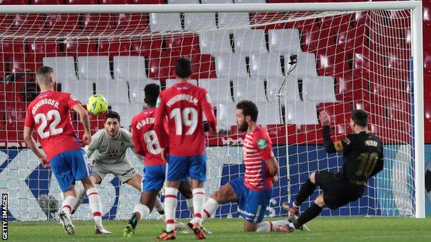 Lionel Messi scores at Granada