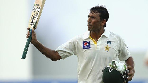 Younus Khan raises his bat