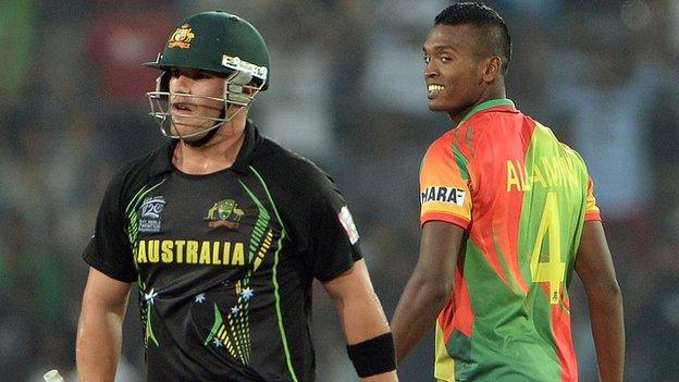 Australia's Aaron Finch and Bangladesh's Al-Amin Hossain