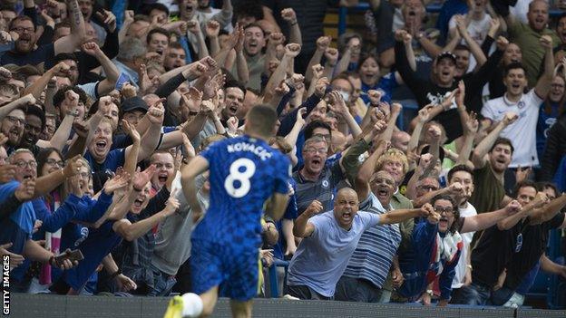 Chelsea fans celebrate inside Stamford Bridge