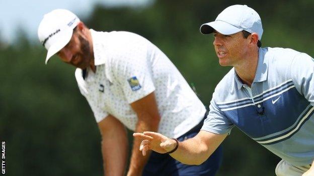 Dustin Johnson (left) and Rory McIlroy