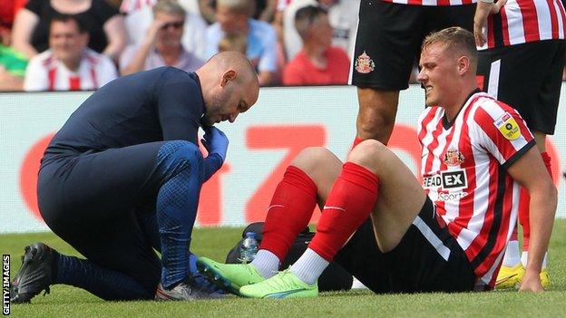 Dan Ballard suffered his foot injury in the 81st minute of Sunderland's 2-2 draw with QPR in the Championship on Saturday