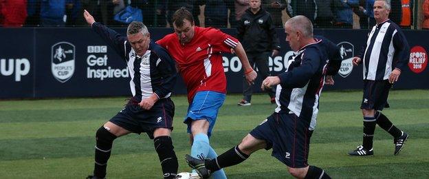 It might be at a slower pace, but walking football is none the less competitive as this action shows