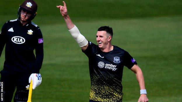 Dan Worrall celebrates taking a wicket for Gloucestershire in the Royal London One Day Cup in 2019