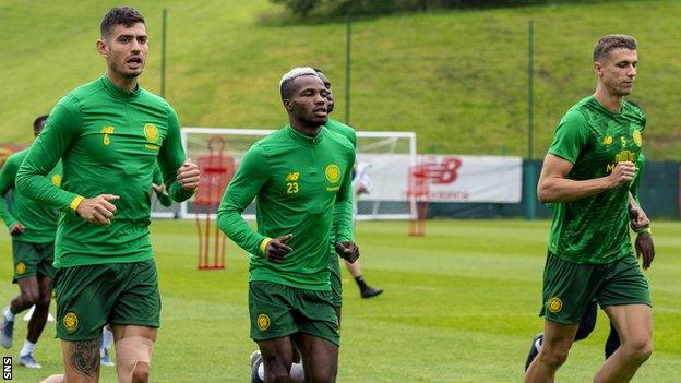 Celtic's Nir Bitton (left) and Jozo Simunovic (right)