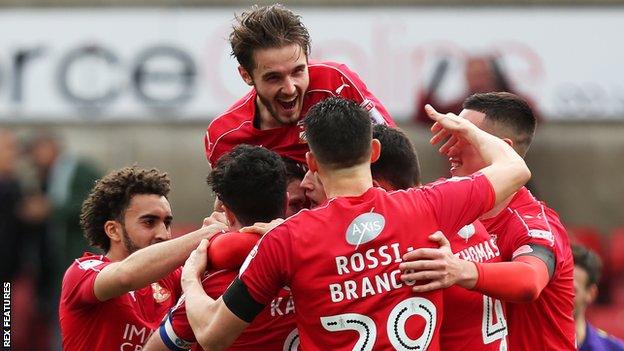 Swindon celebrate Sean Murray's opener