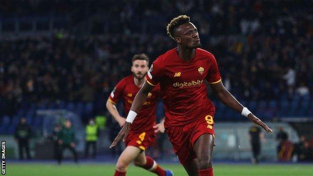 Tammy Abraham celebrates scoring for Roma