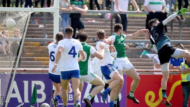 Eoin Donnelly (second from right) rises to score Fermanagh's decisive late goal against Monaghan