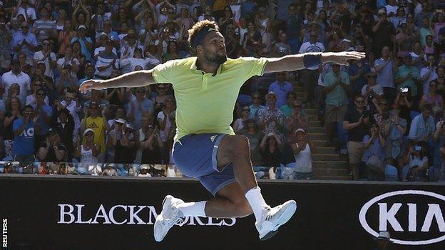 Jo-Wilfried Tsonga celebrates beating Denis Shapovalov at the Australian Open