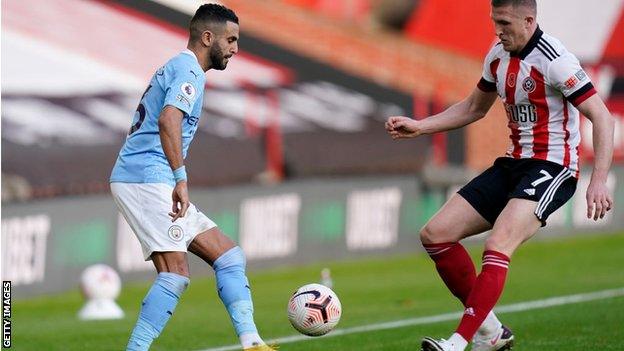 Riyad Mahrez and John Lundstram