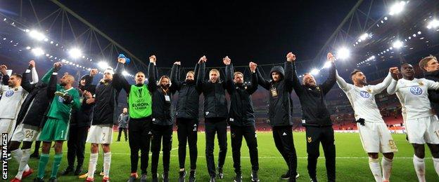 Ostersund celebrate their close defeat to Arsenal at the Emirates Stadium post match