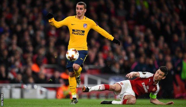 Laurent Koscielny (left) is beaten by Antoine Griezmann