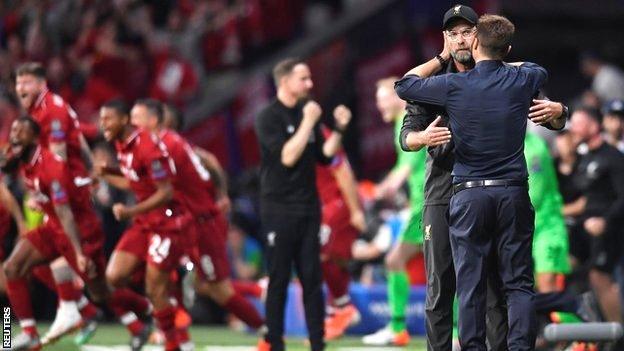 Liverpool manager Jurgen Klopp and Tottenham manager Mauricio Pochettino embrace after the Champions League final