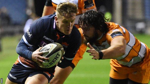 Darcy Graham (left) scores for Edinburgh against Cheetahs