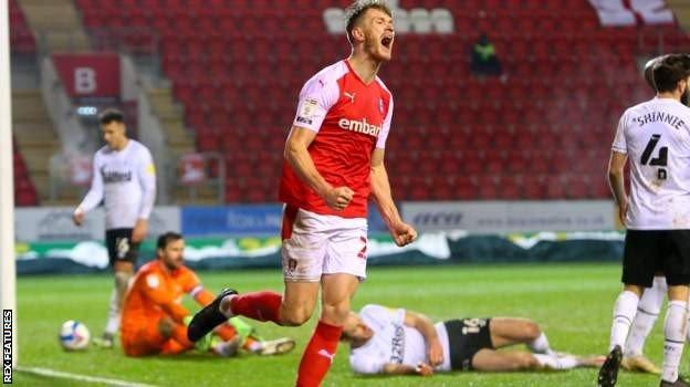 Michael Smith celebrates scoring for Rotherham against Derby County