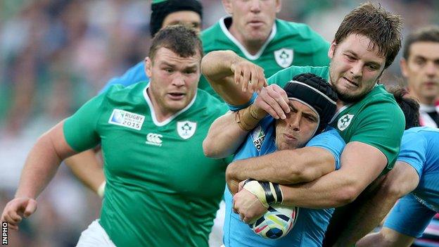 Iain Henderson tackles Italy scrum-half Edoardo Gori in last weekend's World Cup game