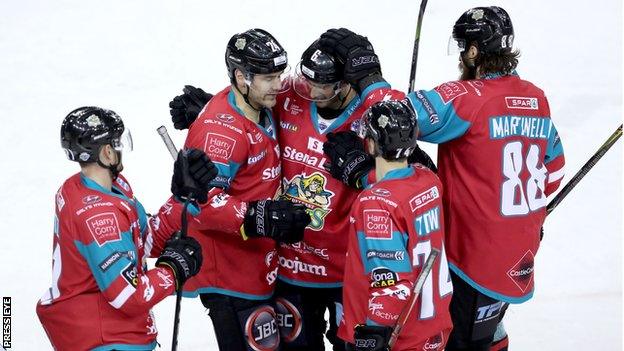 Jonathan Ferland receives congratulations after scoring the Giants' fourth goal