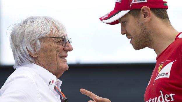 Bernie Ecclestone (left) and Sebastian Vettel