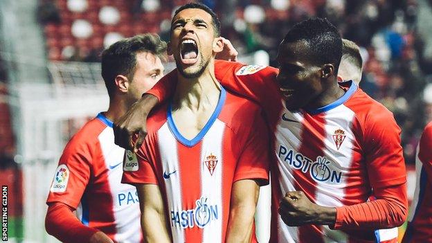 Nick Blackman celebrates scoring Sporting Gijon's winner against Valencia