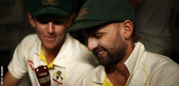 Nathan Lyon and Josh Hazlewood look at the Ashes urn