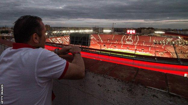 Sevilla fan watches on