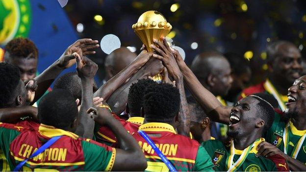 Cameroon players with the Nations Cup trophy after winning the 2017 final