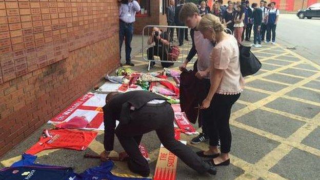 People paying tribute in Walsall