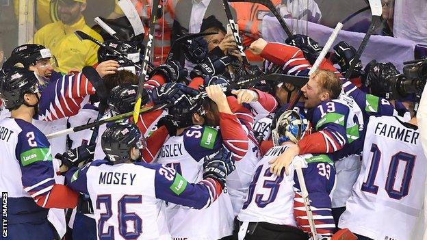 Great Britain celebrate their survival in the top flight